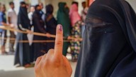 BJP urges verification of burqa-clad voters during Bihar polls, RJD slams demand