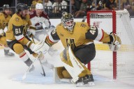 Golden Knights goaltender Akira Schmid reacts to Carter Hart signing