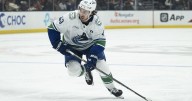 Hughes, Sasson lead Canucks to 8-1 thumping of Flames in pre