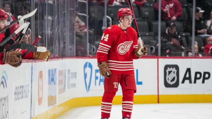 Red Wings open with ugly loss that draws boos, coach's criticism