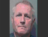 Johnson County Coroner Mike Pruitt Turns Himself in to Johnson County Jail