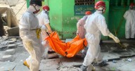Indonesian crews pull more bodies from rubble of collapsed school as death toll rises