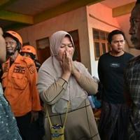 Rescuers search for 59 people trapped under collapsed Indonesian school