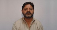 Rochdale grooming gang rapist is still on the run - as victim brands him a 'coward'