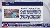 Heroic officers save baby after rollover crash
