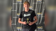 It started with a father’s bet and now he’s swimming for national attention