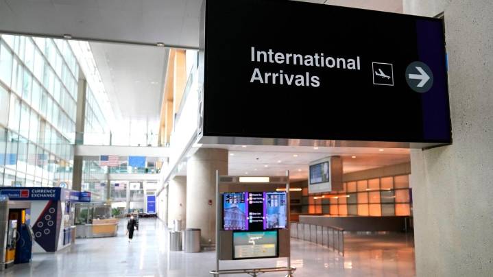 Flight is diverted to Boston after a passenger stabs 2 teens with a fork, authorities say