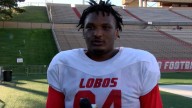 UNM defensive lineman Jalen McIver gets reps and gets a sack