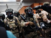 Trump federalizes the National Guard in Chicago, while troops arrive in Oregon