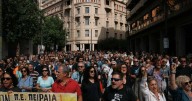 Greek ferries, trains halted as thousands protest