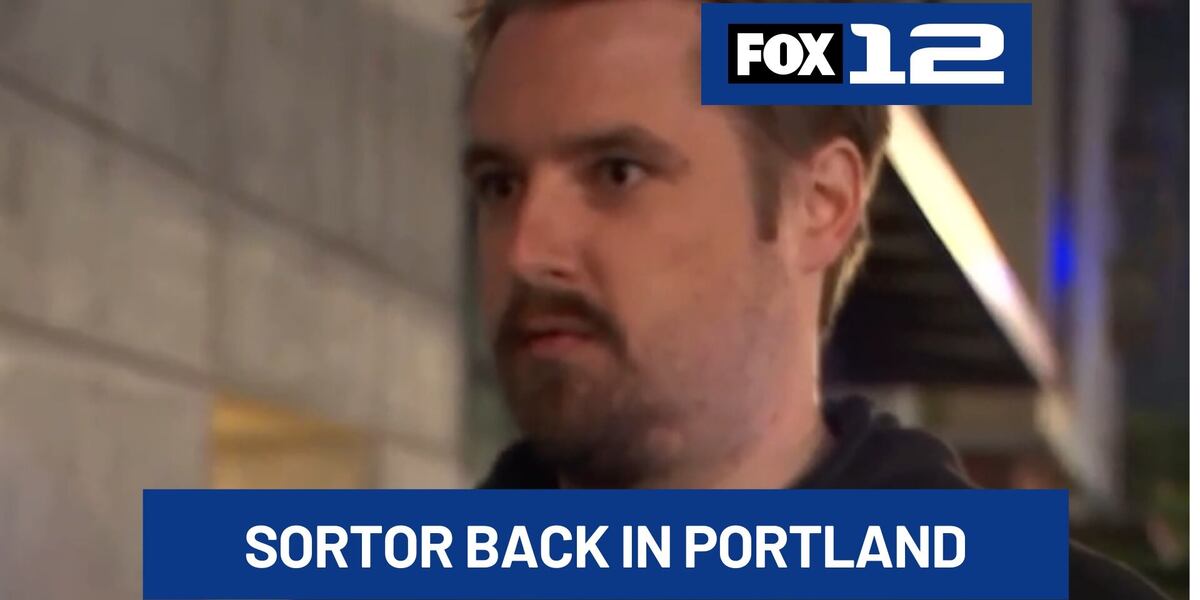 Talking to conservative influencer Nick Sortor outside Portland ICE building