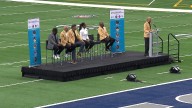 Students learn about mental health and life lessons from football legends at AT&T Stadium