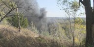 Fire contained at Barney’s Used Cars & Parts, cause under investigation