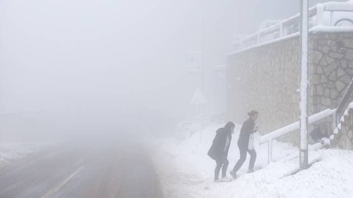 Now SNOWSTORM hits parts of Europe dumping up to 20inches as state of emergency declared after rain hits hols hotspots