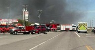 Two people die after fireball plane crashes off Fort Worth highway in Texas