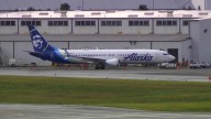 Alaska Airlines says an information technology outage is grounding its flights