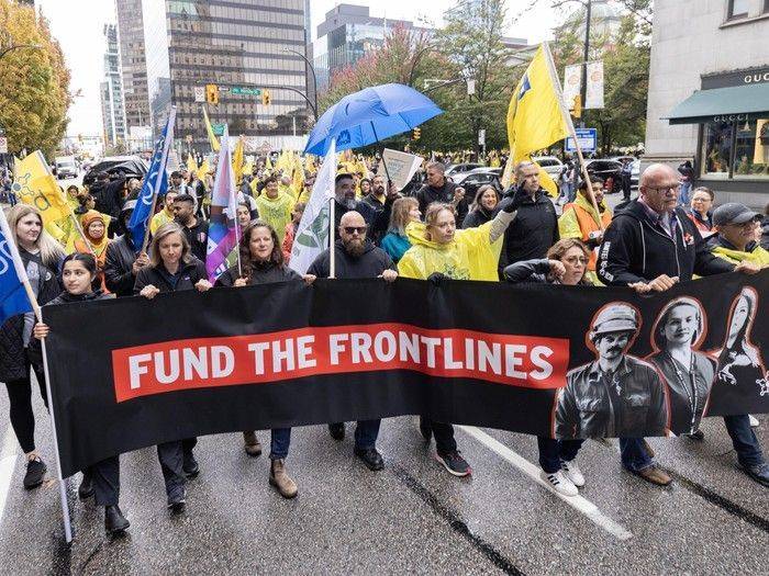 Striking BCGEU members march, rally in downtown Vancouver