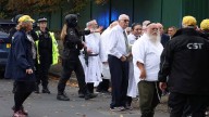 Man drives car into crowd outside Jewish synagogue in Manchester, stabs two to death; attacker shot dead by police