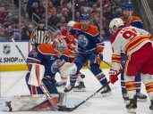 Calgary Flames hand stunned Edmonton Oilers a royal flush on opening night