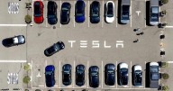 Parents of two college students killed in a Tesla allege design flaw trapped them in the burning car