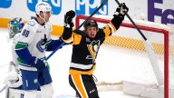 Canucks run out of gas in uneven loss to Penguins