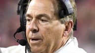 College football writer predicts LSU’s Scott Woodward asking Nick Saban to make ‘tempting’ return to Tigers