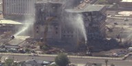 Crews work to demolish former county hospital building in central Phoenix