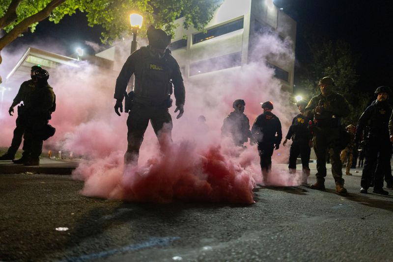 Trump claims without evidence that insurrection is taking place in Portland