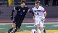 See photos from Okemos-Detroit Catholic Central boys soccer regional