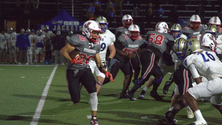 Jenkins football team weathers rain and late rally to beat SE Bulloch
