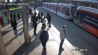 Security guard pulls woman to safety from oncoming tram