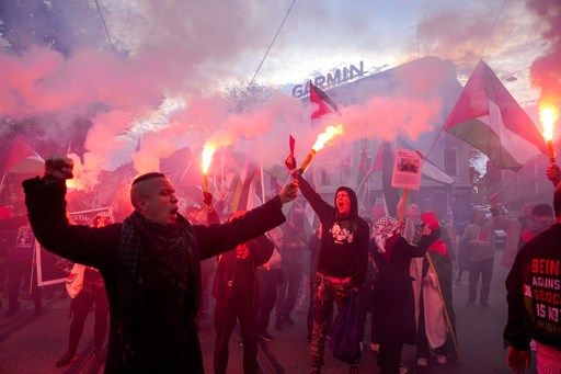 Pro-Palestinian protesters march to stadium ahead of World Cup qualifier between Norway and Israel