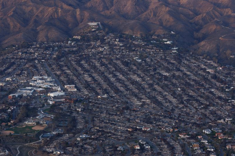 Man arrested as suspect in setting California's deadly Palisades Fire, official says