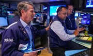 Apple's rally pulls Wall Street to the cusp of its record