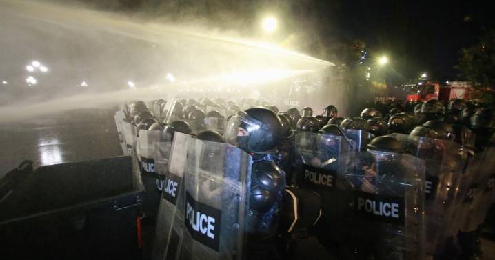 Georgia's police use water cannons to push back protesters trying to storm presidential palace