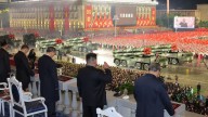 At nighttime military parade, Kim Jong Un shows off Korea’s Hwasong-20 intercontinental ballistic missiles
