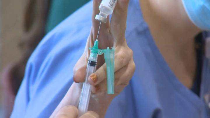 California COVID cases surge early amid vaccine confusion