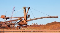 ASX 200 lifts as BHP's share price takes a hit amid conflicting reports China has banned purchases of the company's iron ore