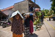 Photos: Hopes dim for survivors after Indonesia school building collapses