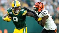 Josh Jacobs battles through illness, has 2 TDs in Packers' win