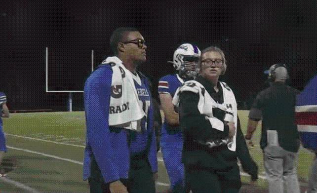 Football player returns to the sidelines after being airlifted during previous game