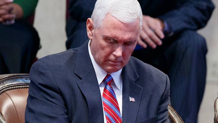 Damaging Photo Surfaces Of Mike Pence Peeking During Prayer