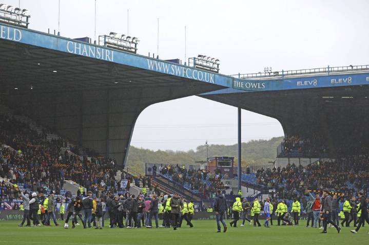 Sheffield Wednesday fans enter pitch to protest against club ownership