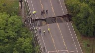 Big sinkhole opens up across entire road in Jeffersontown