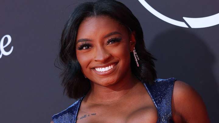 Simone Biles Confirms Boob Job with Joyful Trampoline Video