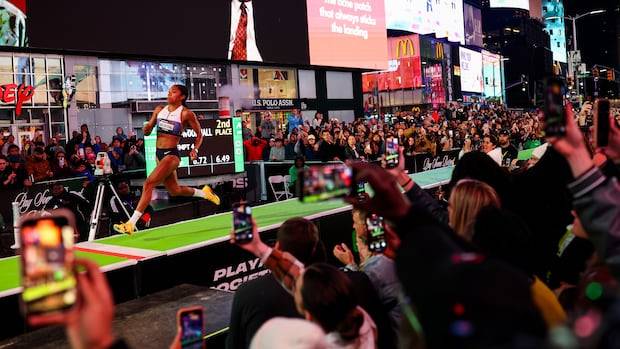 Women's long jump takes over Times Square as Athlos brings track to the bright lights