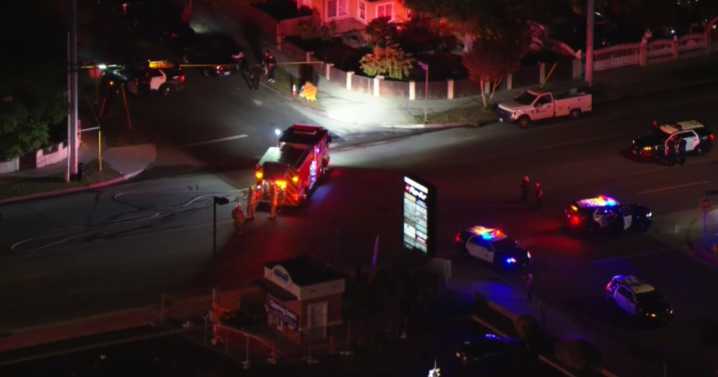 Sylmar homes evacuated by police after car crashes into gas line