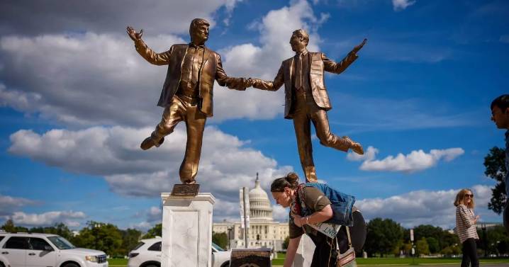Iconic Trump-Epstein friendship statue reinstated after being toppled by supporters