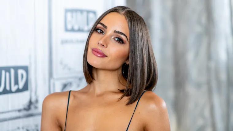McCaffrey’s bronzed wife flaunts chiseled core in sizzling ‘SI’ Swim throwback