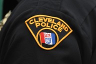 Suspect found shot in stolen car, arrested in CLE